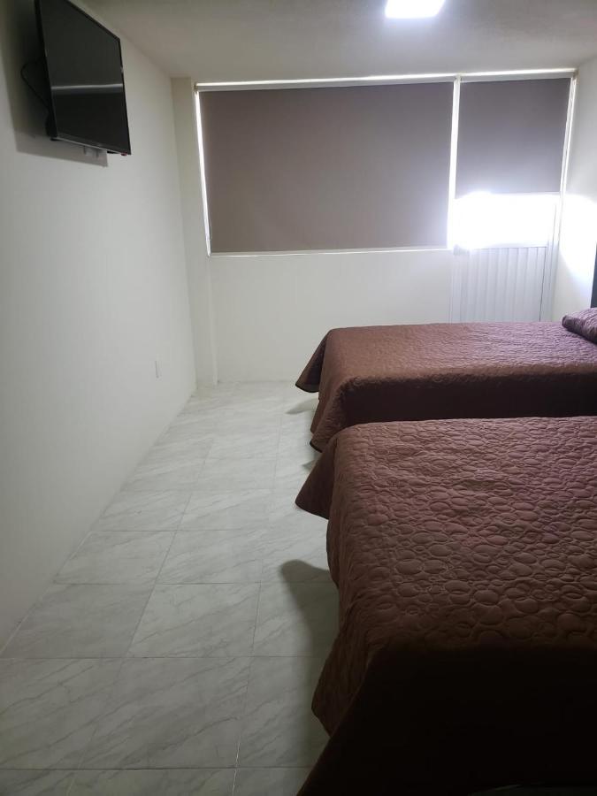 Hotel Estadia Leon Bagian luar foto